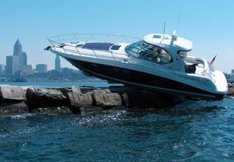 boat crash into jetty rocks